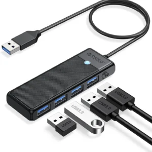 ORICO 4-Port USB 3.0 Hub Four USB ports illuminated with blue LED lights on the ORICO hub