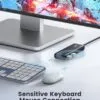 Laptop connected to the ORICO USB hub, demonstrating seamless integration.