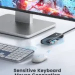 Laptop connected to the ORICO USB hub, demonstrating seamless integration.