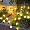 Swaying firefly garden lights with solar charging panels